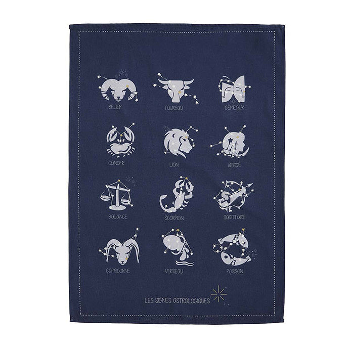 A blue cotton tea towel with white astrological signs printed on it, displayed flat.