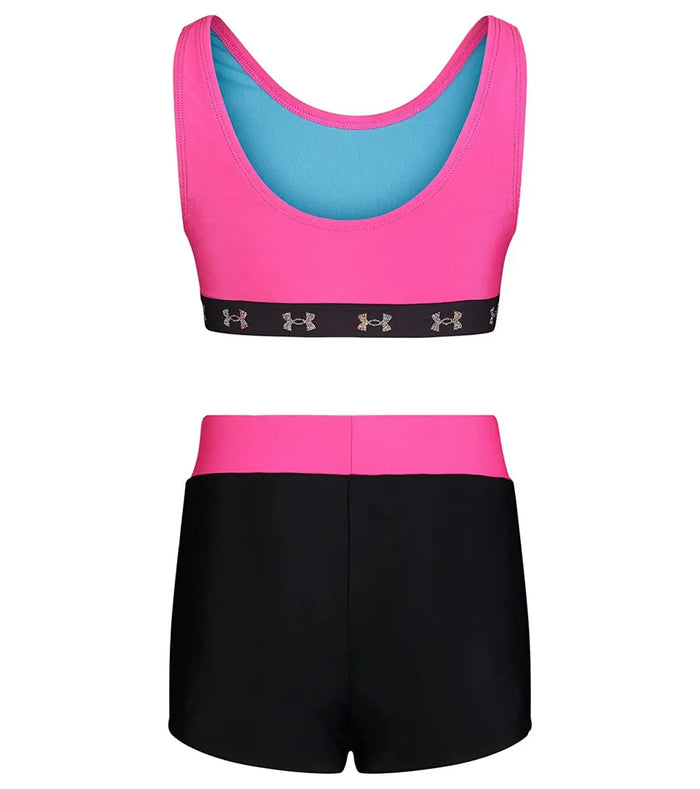 Back view of Under Armour girls two-piece swim set showing Pink tank top and Black swim shorts.